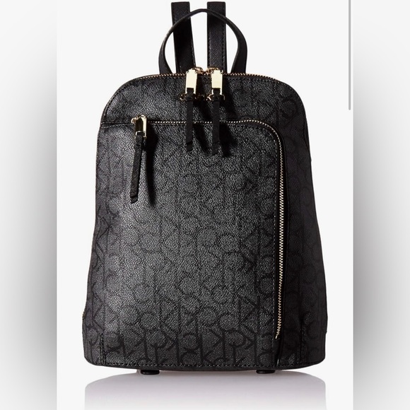 Calvin Klein Handbags - Calvin Klein Hudson Monogram Front Half Zip Pocket Backpack